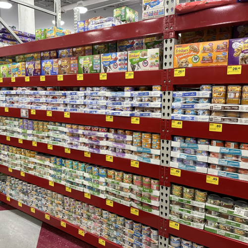 Cat food on the shelves inside of the Pet Goods store