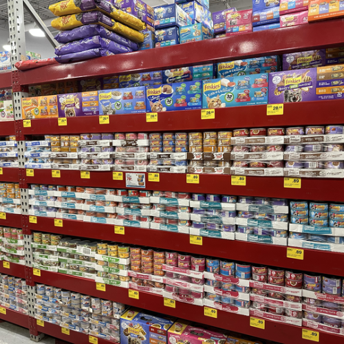 Cat food on the shelves inside of the Pet Goods store